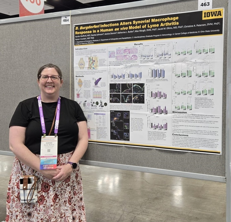 KariAn with her poster at AAI 2025